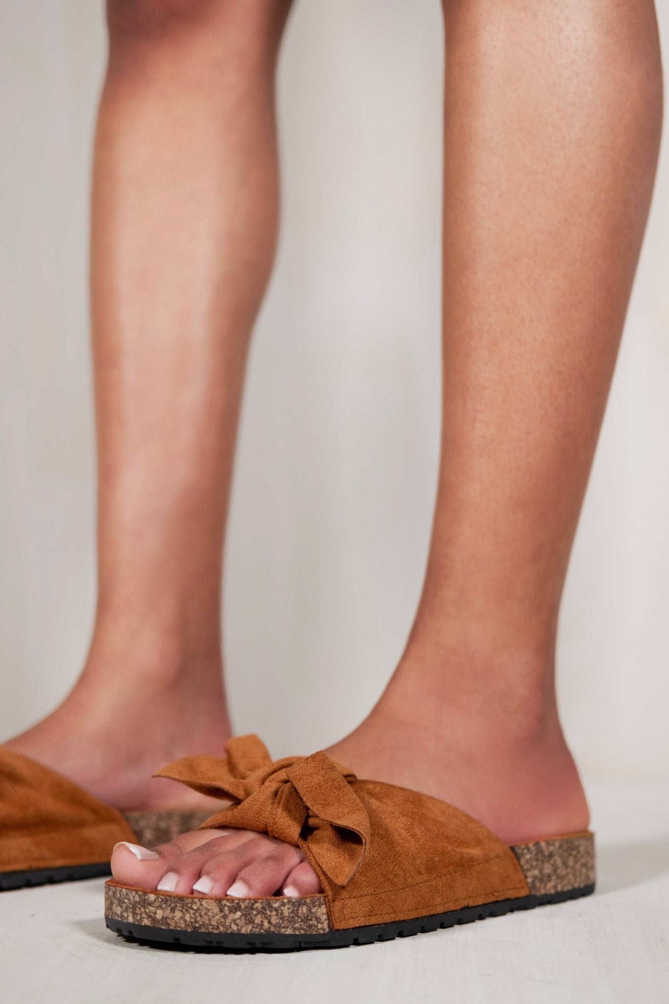 CALLIOPE SLIP ON SLIDER WITH LARGE BOW FRONT IN CAMEL SUEDE - Popular trends empire