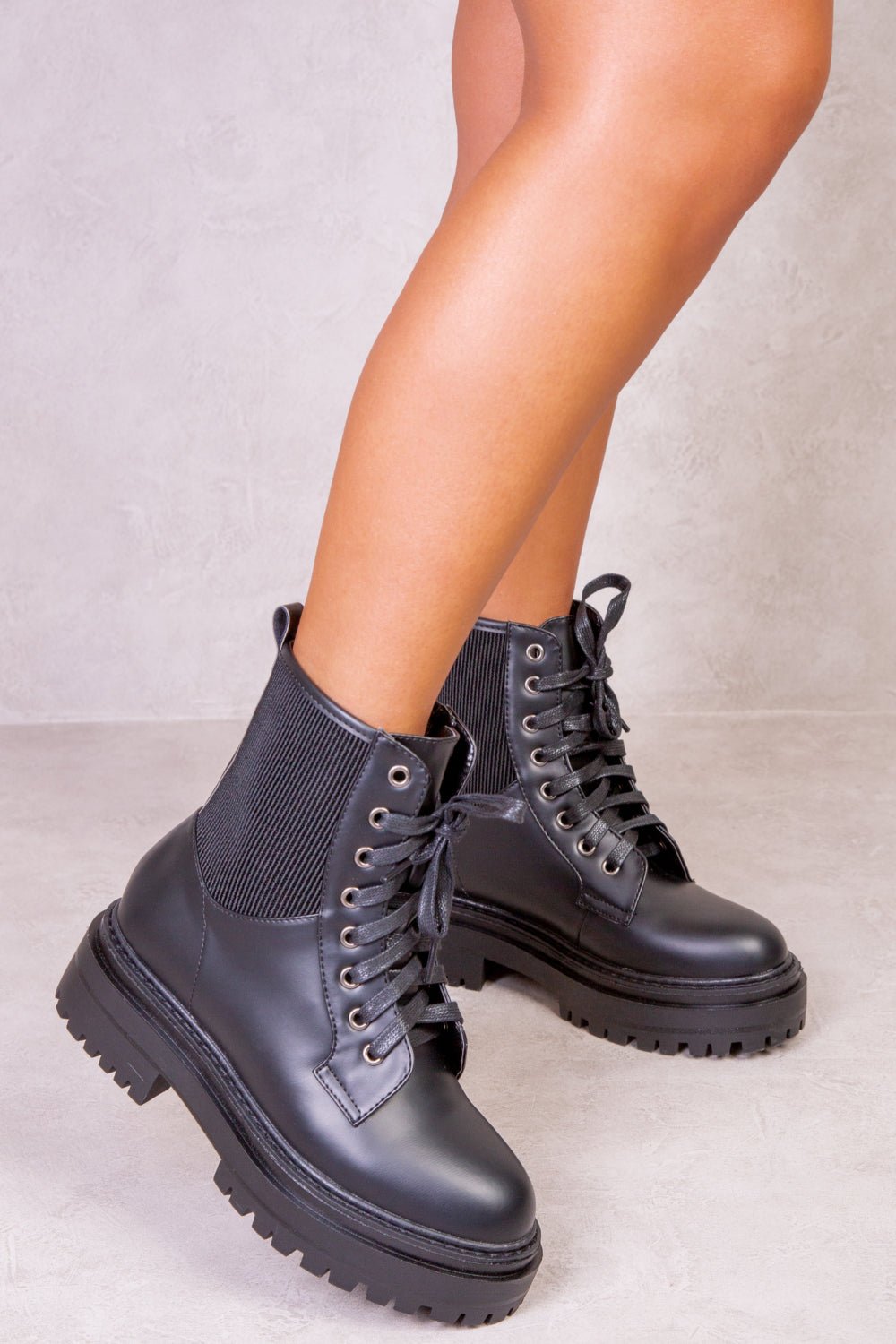 HEATHER CHUNKY LACE UP ANKLE BOOT WITH ELASTIC IN BLACK FAUX LEATHER - Popular trends empire