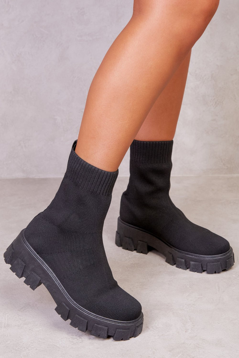 CHELSEA CHUNKY BOOT WITH KNITTED SOCK IN BLACK - Popular trends empire
