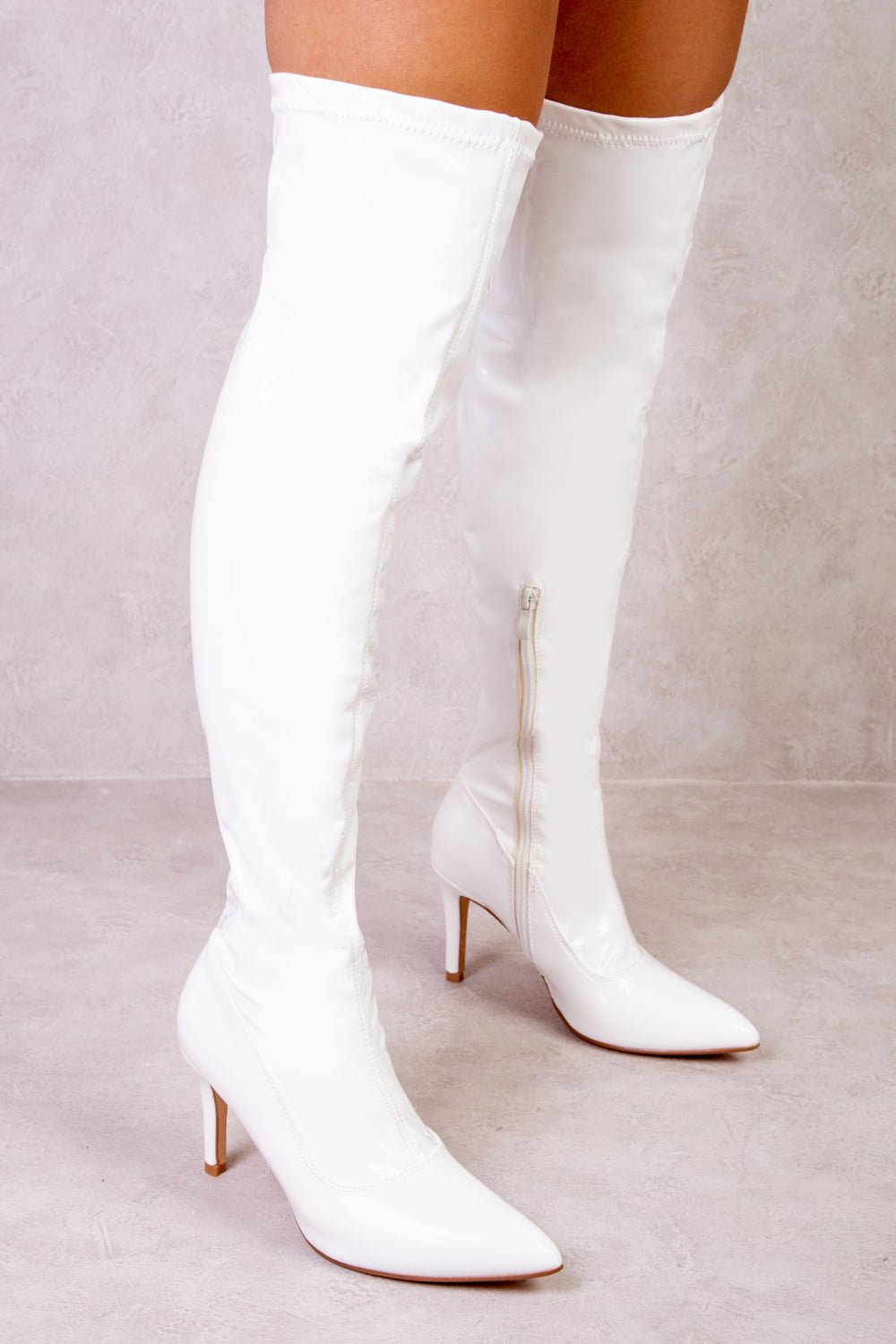 LEXI OVER THE KNEE BOOTS WITH STILETTO HEELS IN WHITE PATENT FAUX LEATHER - Popular trends empire
