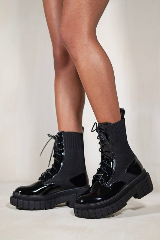 NELLIE CHUNKY ANKLE BOOT WITH KNITTED ELASTIC AND LACE UP IN BLACK PATENT FAUX LEATHER - Popular trends empire