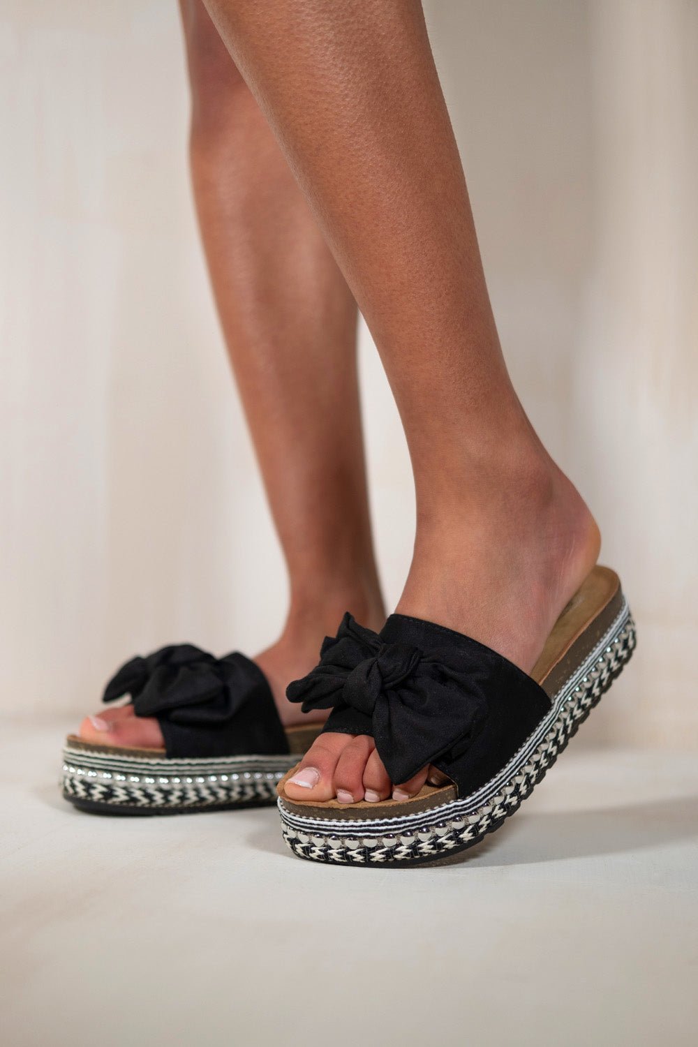 XIMENA CHUNKY SOLE SLIDER STUDDED FRONT BOW DETAIL IN BLACK SUEDE - Popular trends empire